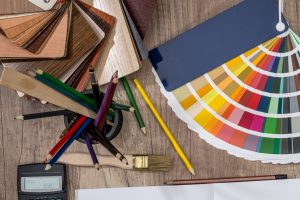 Wooden samples for furniture with blank note on desk