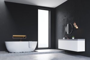 Corner of bathroom with window and sink